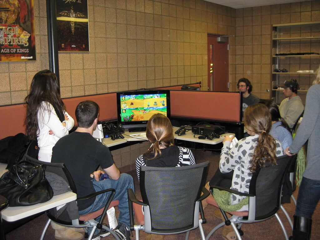 Students playing video games in common room
