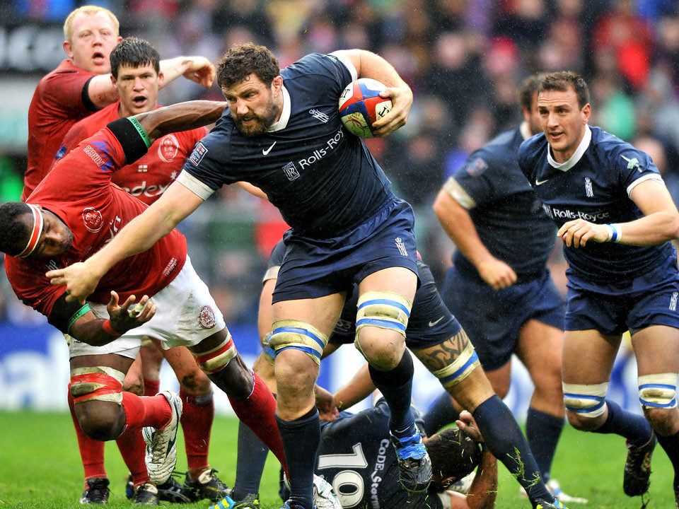 Rugby players scoring try at posts